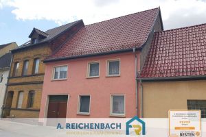 Reihenmittelhaus mit großem Grundstück, Nebengebäuden und Ausbaupotenzial in Gräfenhainichen